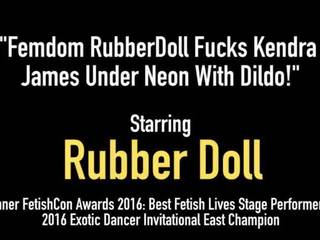 Femdom RubberDoll Fucks Kendra James under Neon with Dildo!